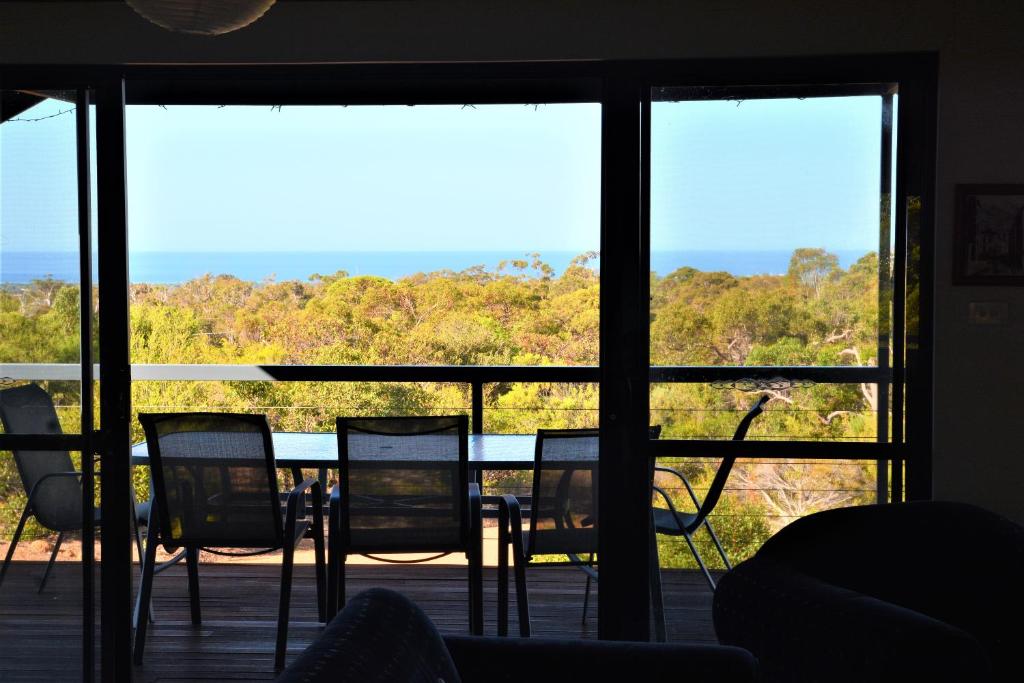 a view from a room with a table and chairs at Surinam in Dunsborough