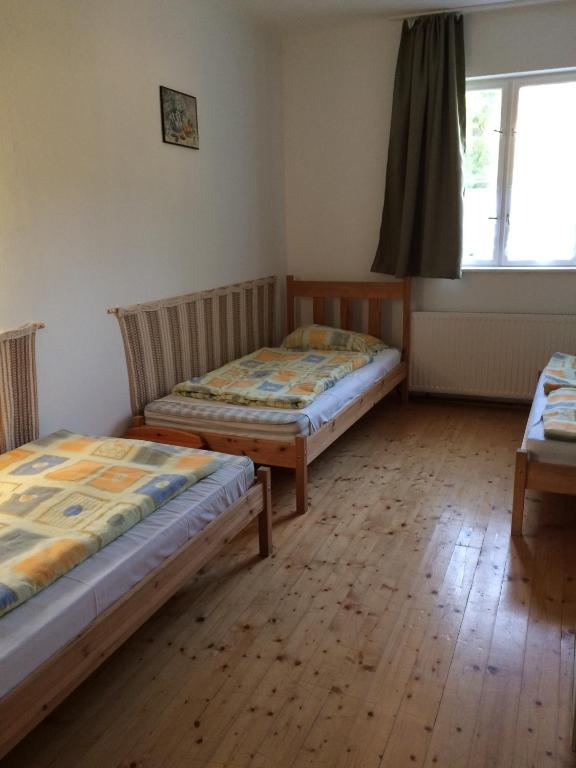 Posteľ alebo postele v izbe v ubytovaní Fasor vendégház