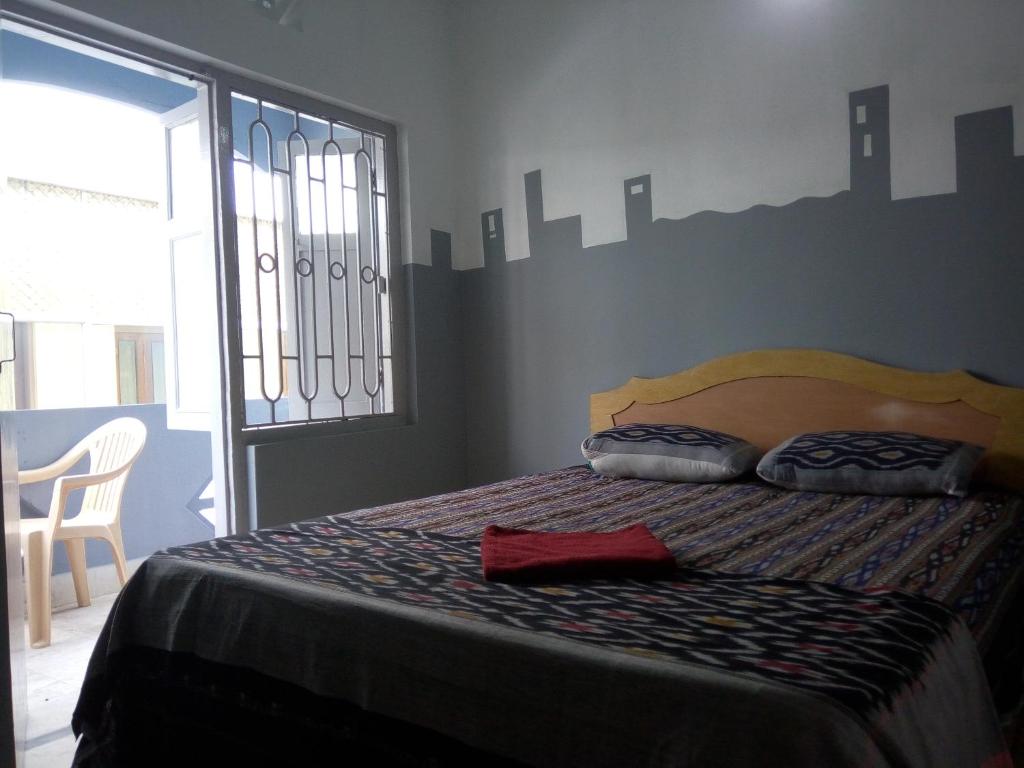 Postel nebo postele na pokoji v ubytování NIRMAN beach homestay