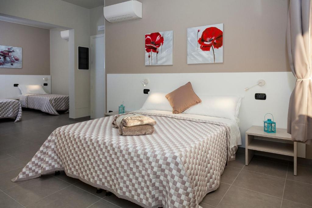 Posteľ alebo postele v izbe v ubytovaní Riviera HUB
