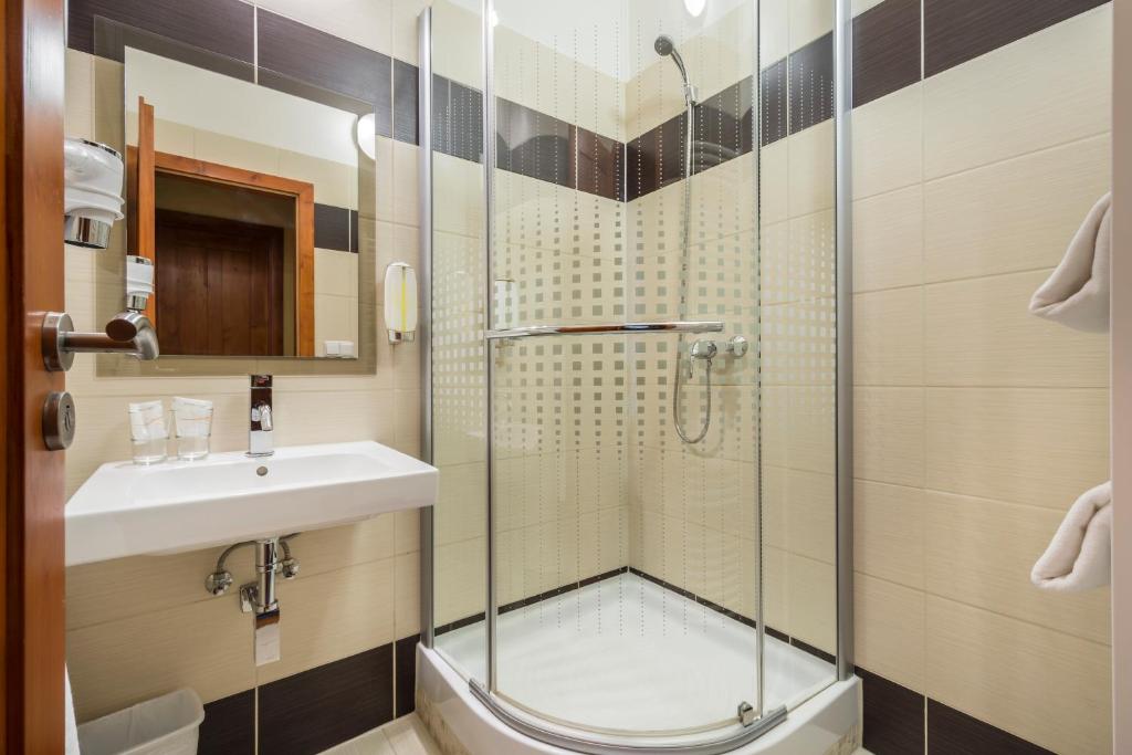 Koupelna v ubytování Hotel Arte