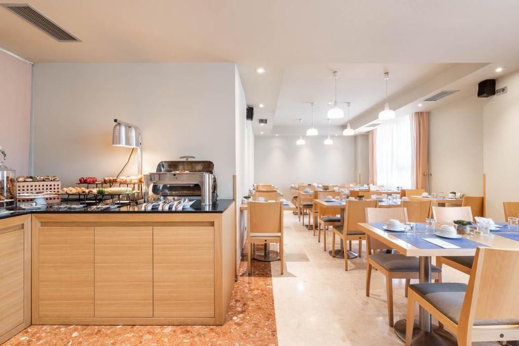 Kuchyň nebo kuchyňský kout v ubytování Aparthotel Exe Campus San Mamés