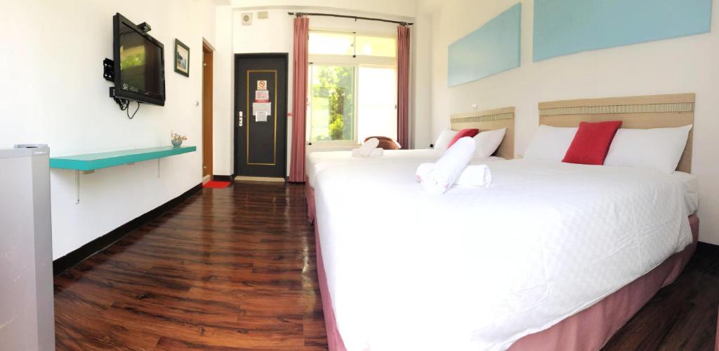 Postel nebo postele na pokoji v ubytování Otousann B&B