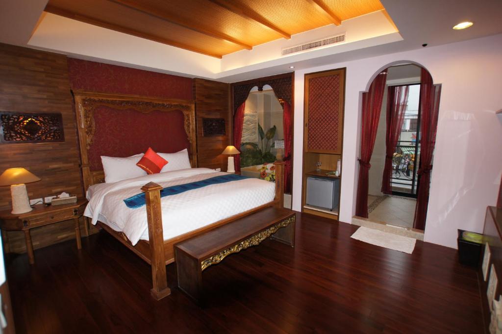 Letto o letti in una camera di Xiu Feng
