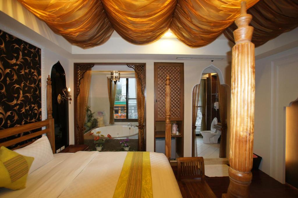 Letto o letti in una camera di Xiu Feng