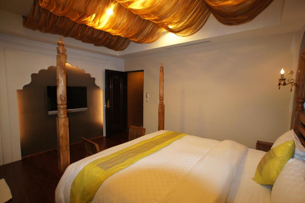 Letto o letti in una camera di Xiu Feng