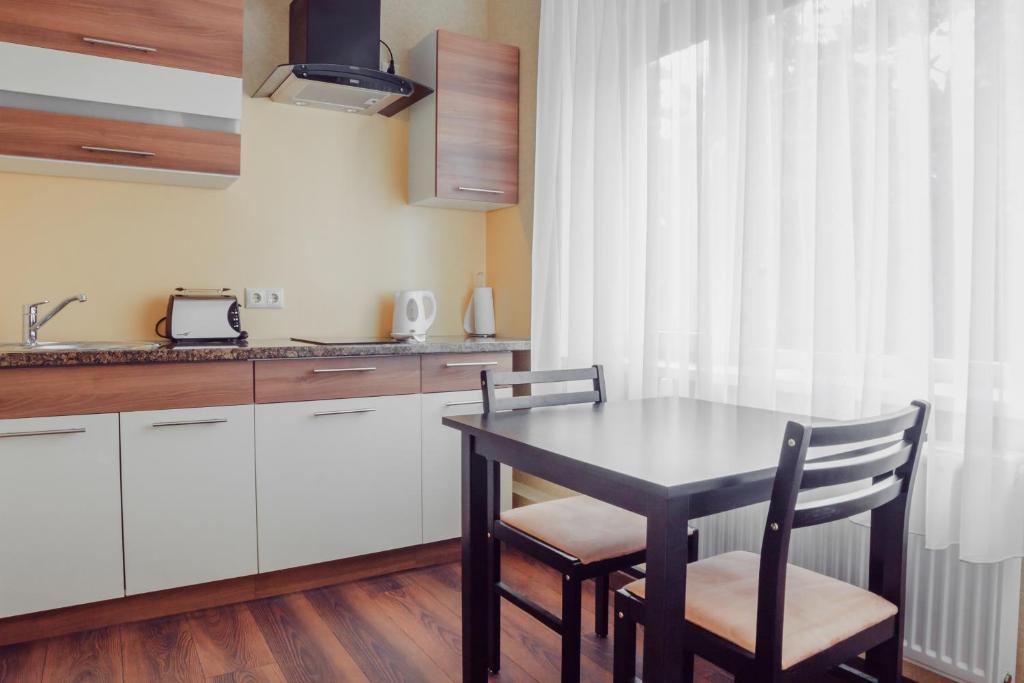 Kuchyň nebo kuchyňský kout v ubytování Vallery Guest House
