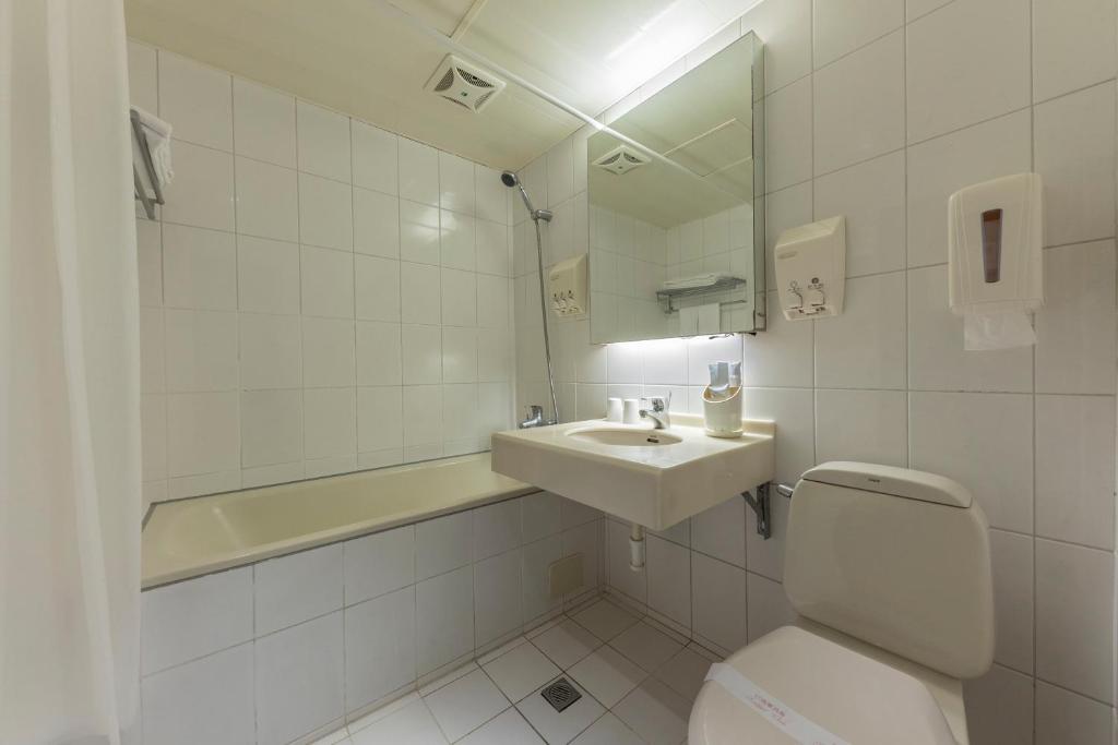 Koupelna v ubytování Bitan Hotel