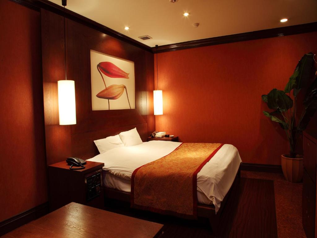 Postel nebo postele na pokoji v ubytování Hotel Cuna Kyoto Love Hotel