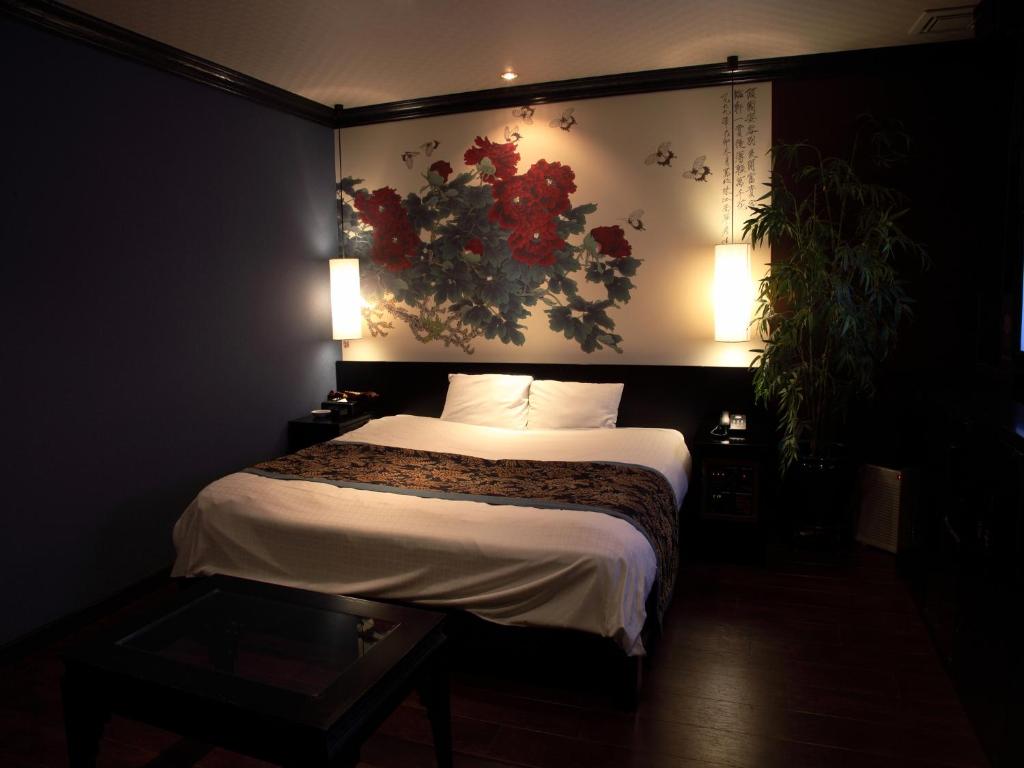 Postel nebo postele na pokoji v ubytování Hotel Cuna Kyoto Love Hotel