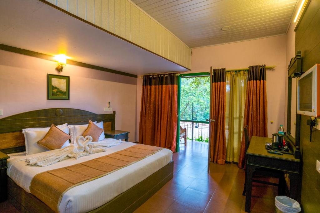 Postel nebo postele na pokoji v ubytování Upavan Resort