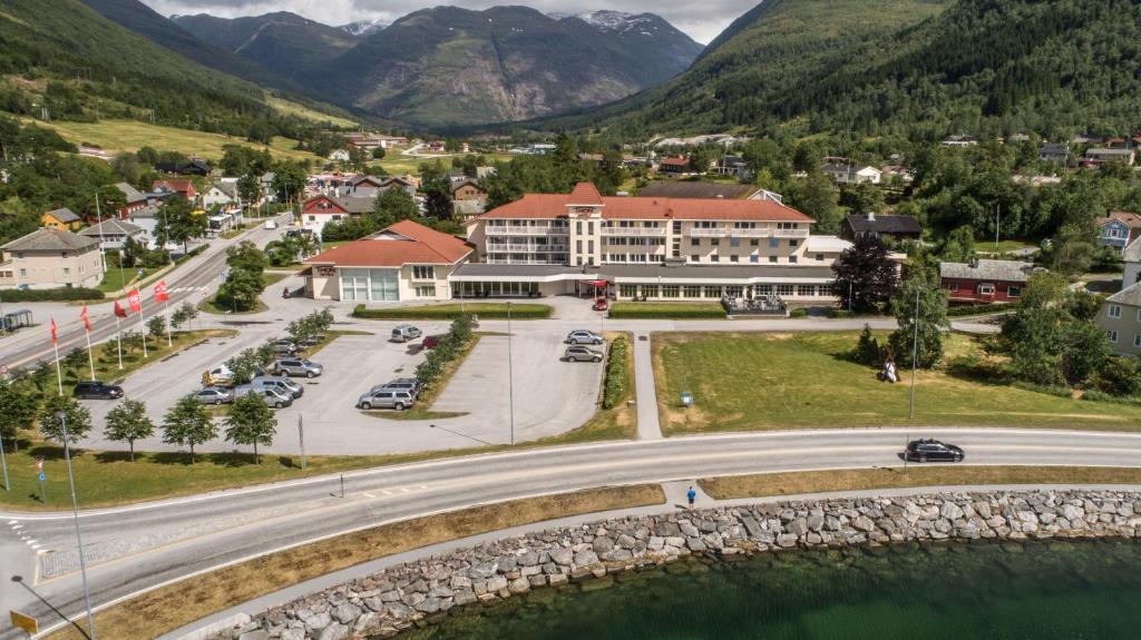 an aerial view of a town in the mountains at Thon PartnerHotel Jølster in Skei 