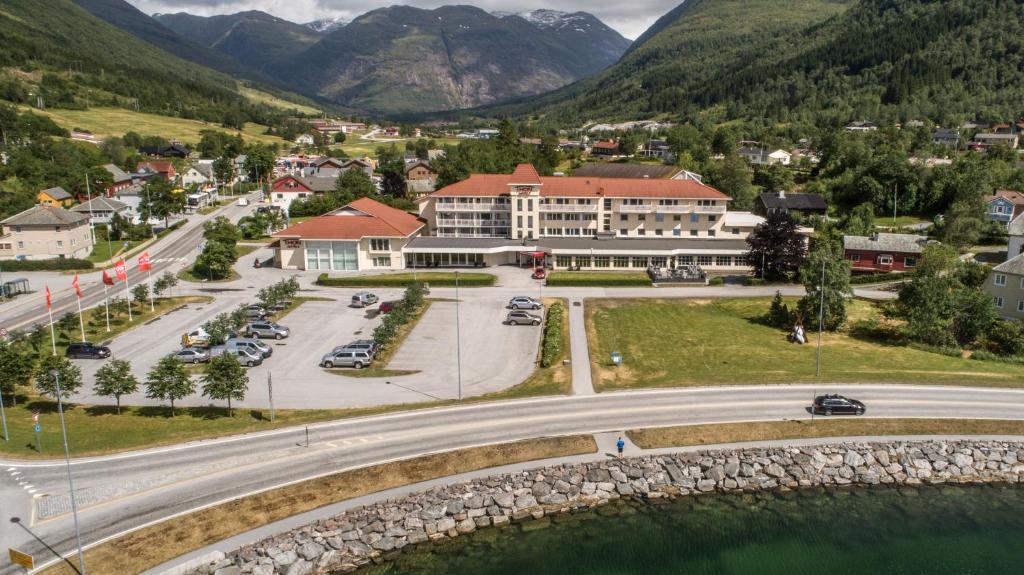 an aerial view of a town in the mountains at Thon PartnerHotel Jølster in Skei