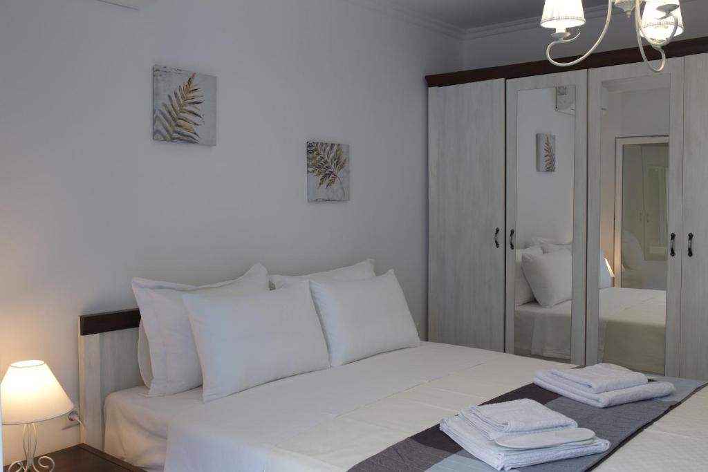 Posteľ alebo postele v izbe v ubytovaní Blue4Aqua Apartments