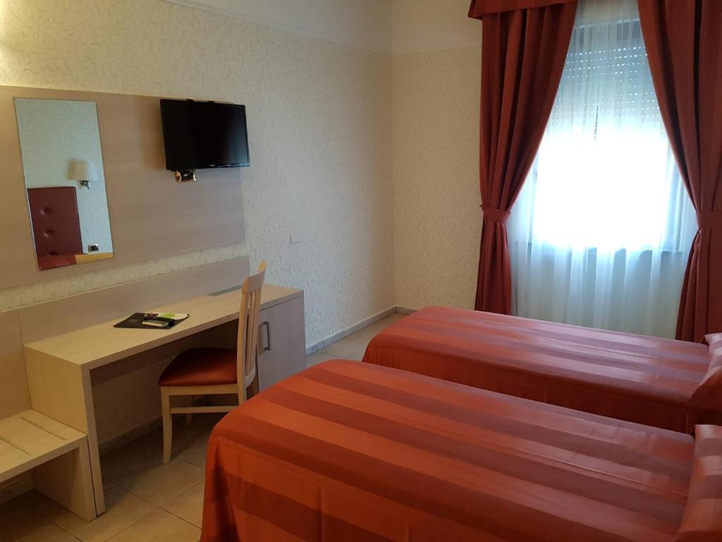 TV a/nebo společenská místnost v ubytování Hotel Villa Rosa