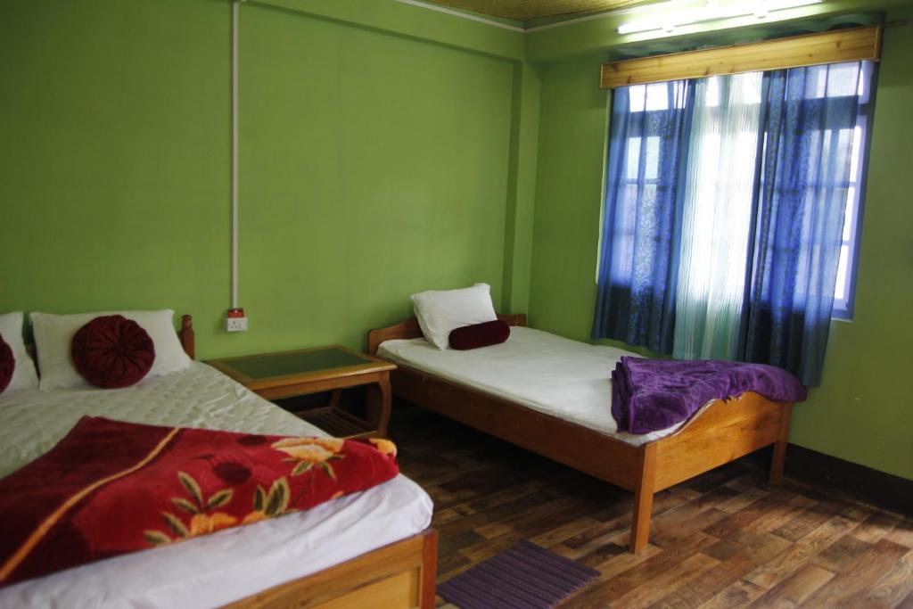 Vamoose Orchid Villa Homestay - Habitación Triple De Lujo