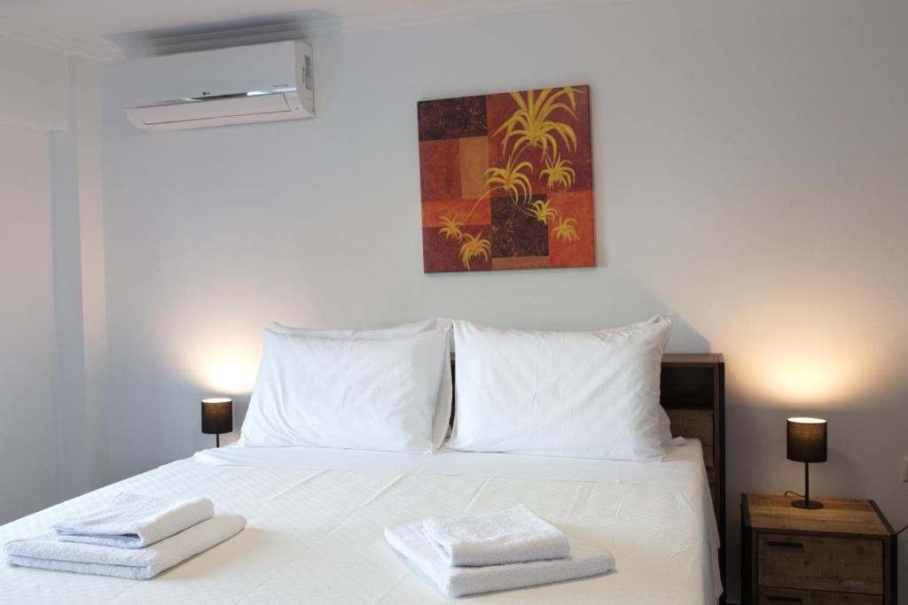 Posteľ alebo postele v izbe v ubytovaní Blue4Aqua Apartments