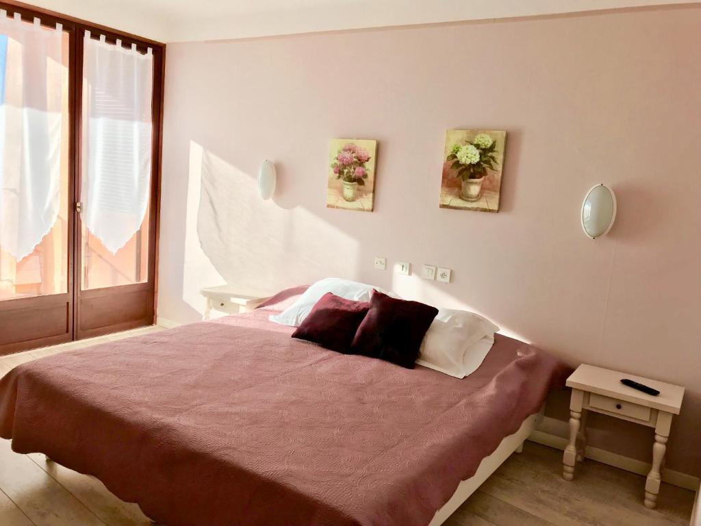 Postel nebo postele na pokoji v ubytování Hotel Celine