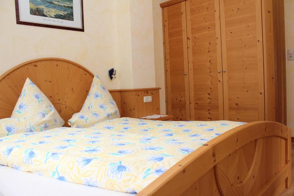 Postel nebo postele na pokoji v ubytování Appartements Moahof Zuhaus