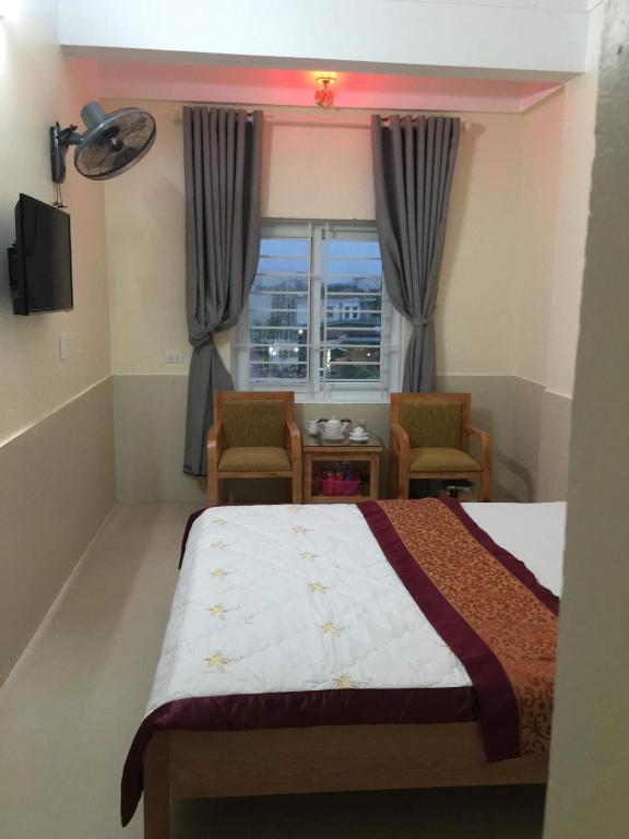Postel nebo postele na pokoji v ubytování Phương Phương 2 Hotel