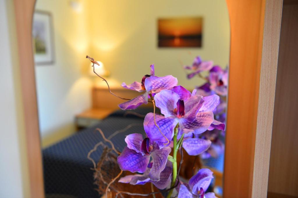 Postel nebo postele na pokoji v ubytování Hotel Lo Smeraldo