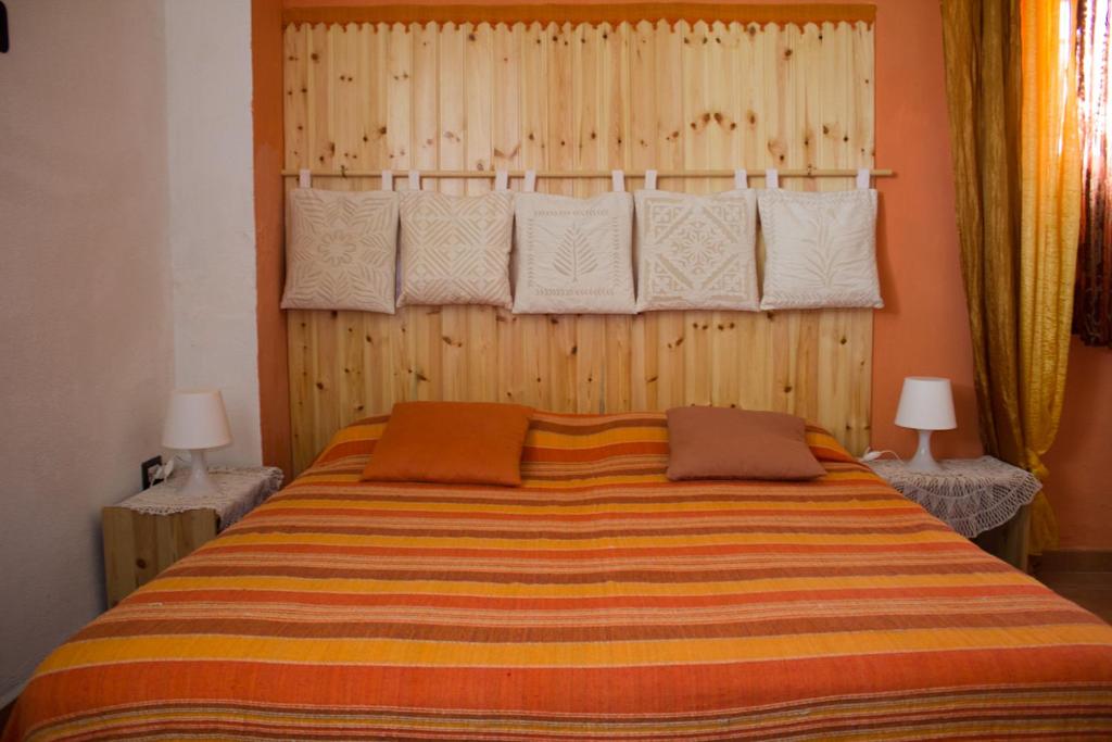 Postel nebo postele na pokoji v ubytování Villa Lancellotti