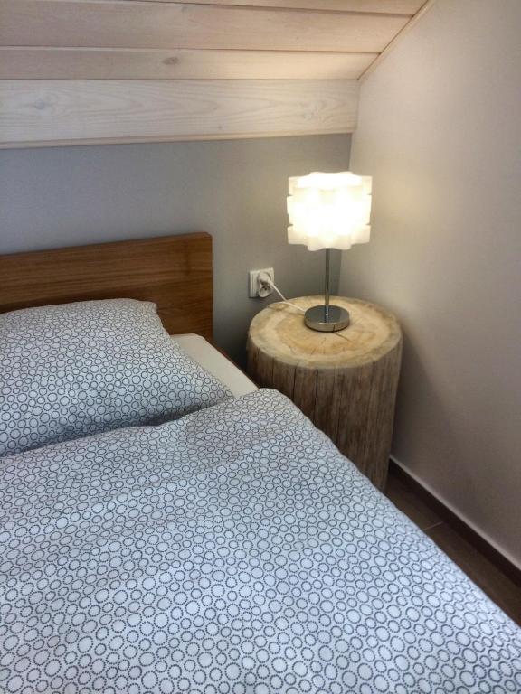 Postel nebo postele na pokoji v ubytování Domek na Siglanach