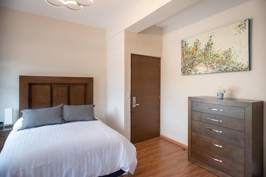 Postel nebo postele na pokoji v ubytování Hotel Posada XR
