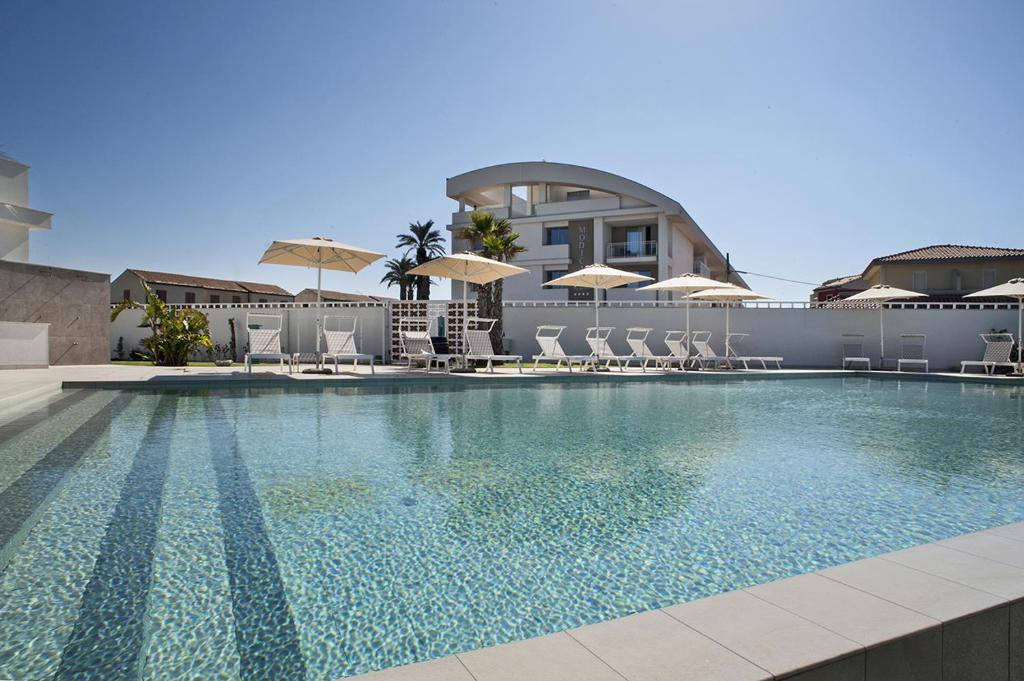 Bazén v ubytování Modica Beach Resort nebo v jeho okolí