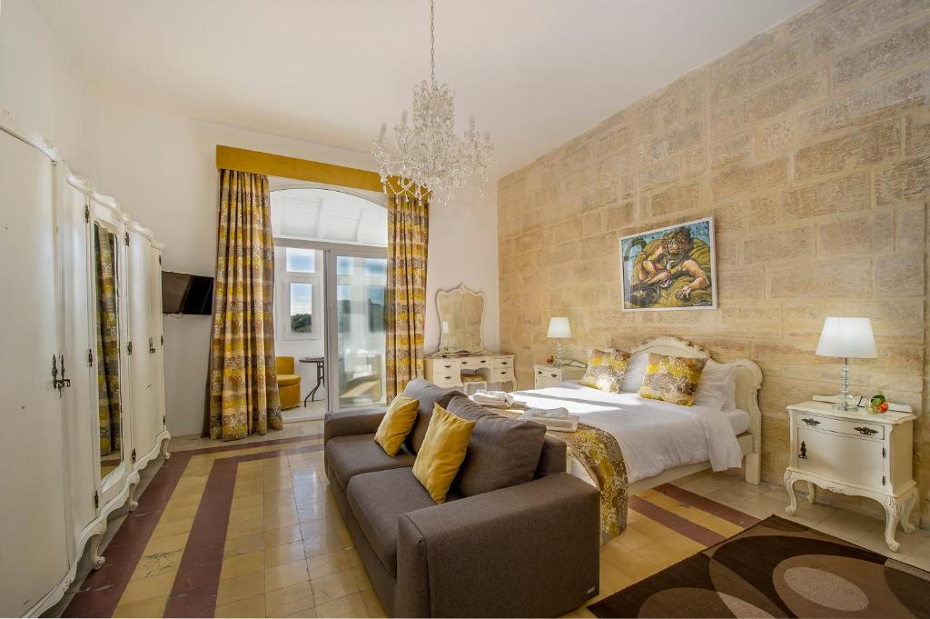 Łóżko lub łóżka w pokoju w obiekcie Point de vue Guesthouse