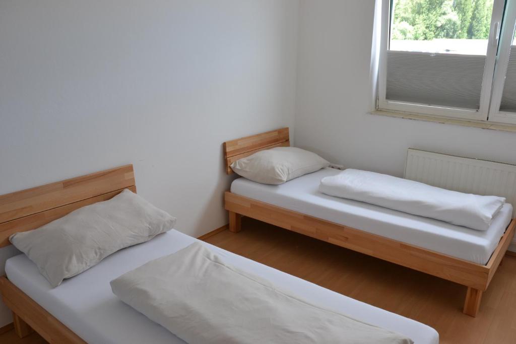 Postel nebo postele na pokoji v ubytování Workers Apartment für die besten Monteure in 8600 Bruck Mur und in 8700 Leoben