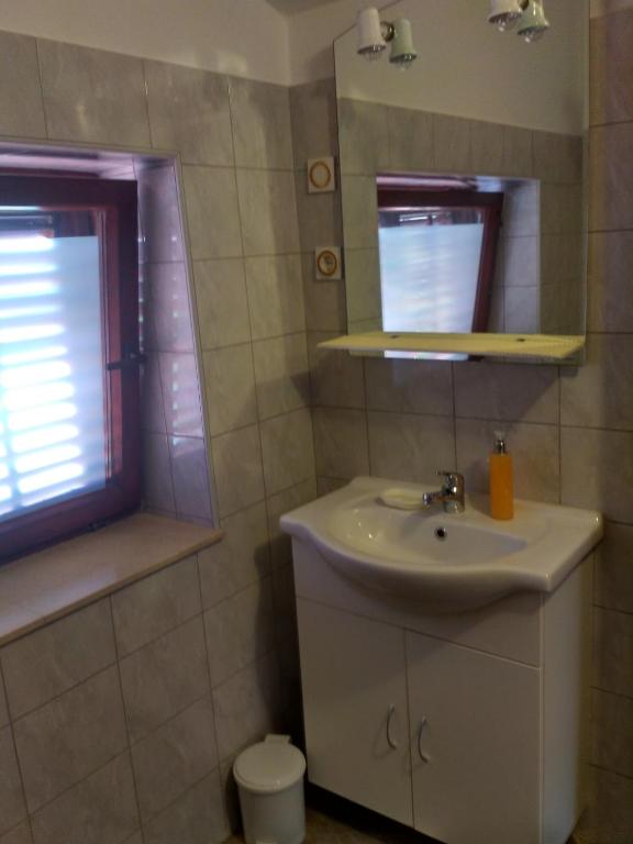 Kúpeľňa v ubytovaní Apartmani Tonica