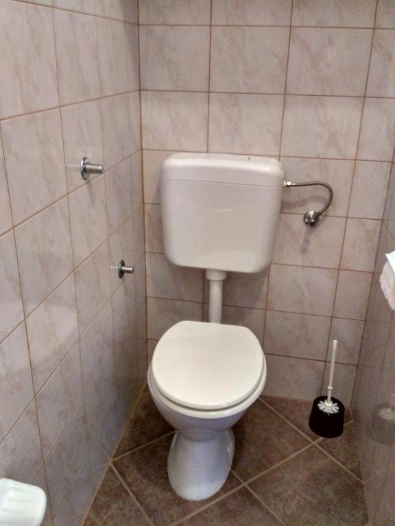 Kúpeľňa v ubytovaní Apartmani Tonica