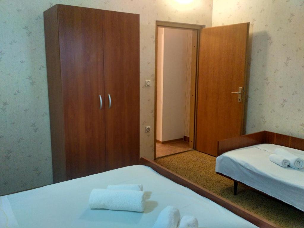 Posteľ alebo postele v izbe v ubytovaní Apartmani Tonica