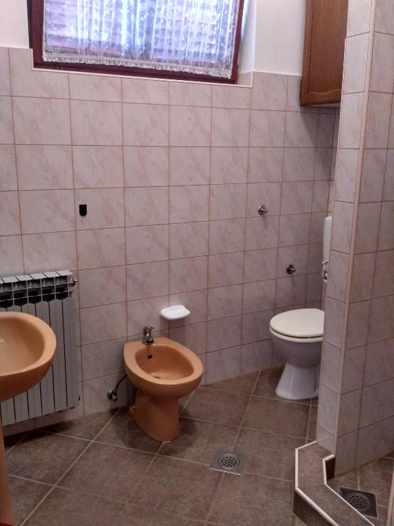 Kúpeľňa v ubytovaní Apartmani Tonica