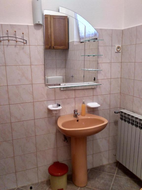 Kúpeľňa v ubytovaní Apartmani Tonica