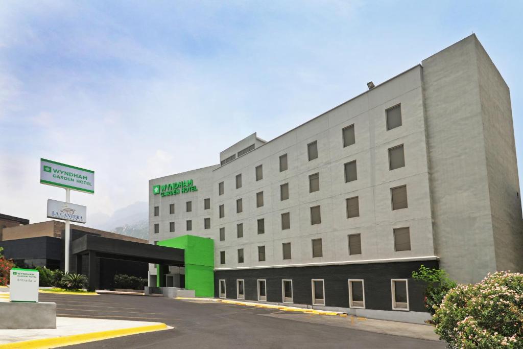 a rendering of the exterior of a hotel at Wyndham Garden Monterrey Valle Real in Monterrey