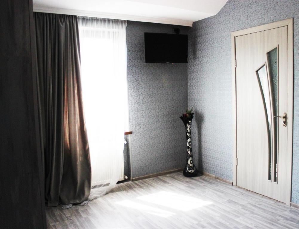 TV a/nebo společenská místnost v ubytování Golden Way