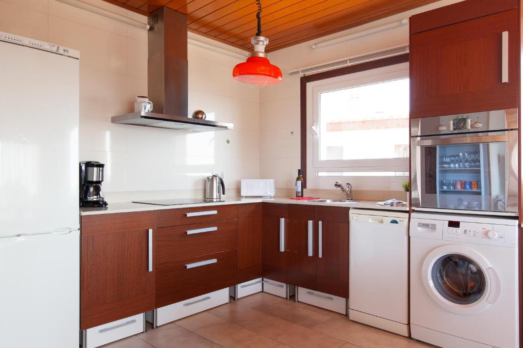 A kitchen or kitchenette at Lets Holidays Apartment Costa Brava