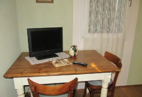 Televízia a/alebo spoločenská miestnosť v ubytovaní Agriturismo Antiche Mura