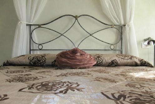 Posteľ alebo postele v izbe v ubytovaní Agriturismo Antiche Mura