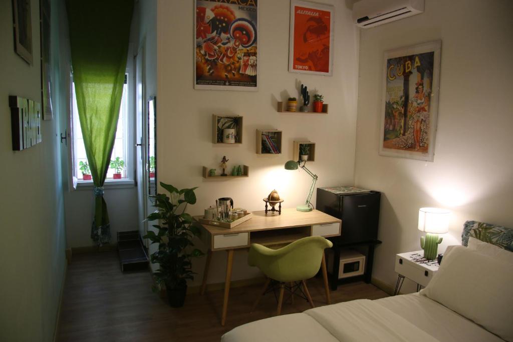 A bed or beds in a room at Mila Guest House