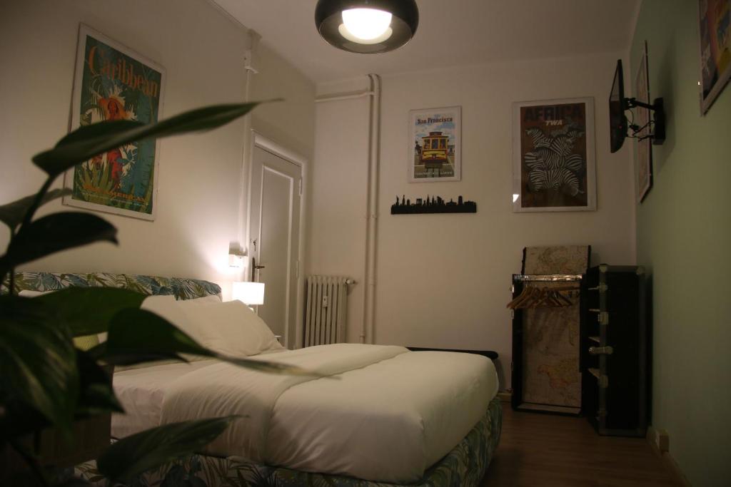 A bed or beds in a room at Mila Guest House