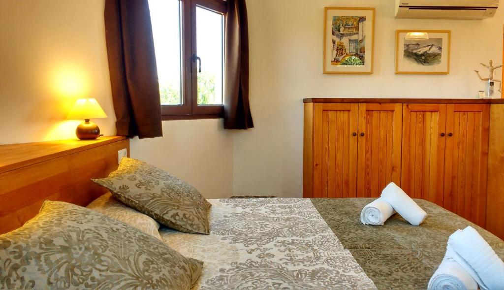 Postel nebo postele na pokoji v ubytování Cortijo Algabia