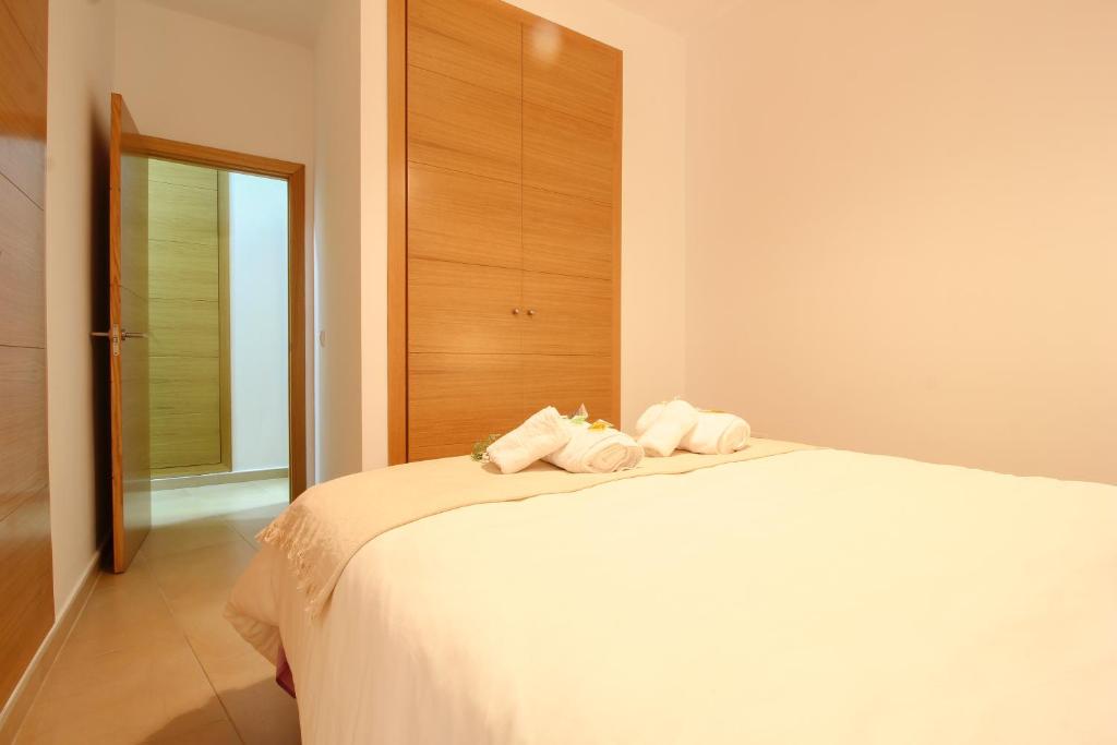 A bed or beds in a room at Apartamento San Julian