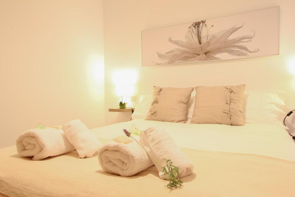 A bed or beds in a room at Apartamento San Julian