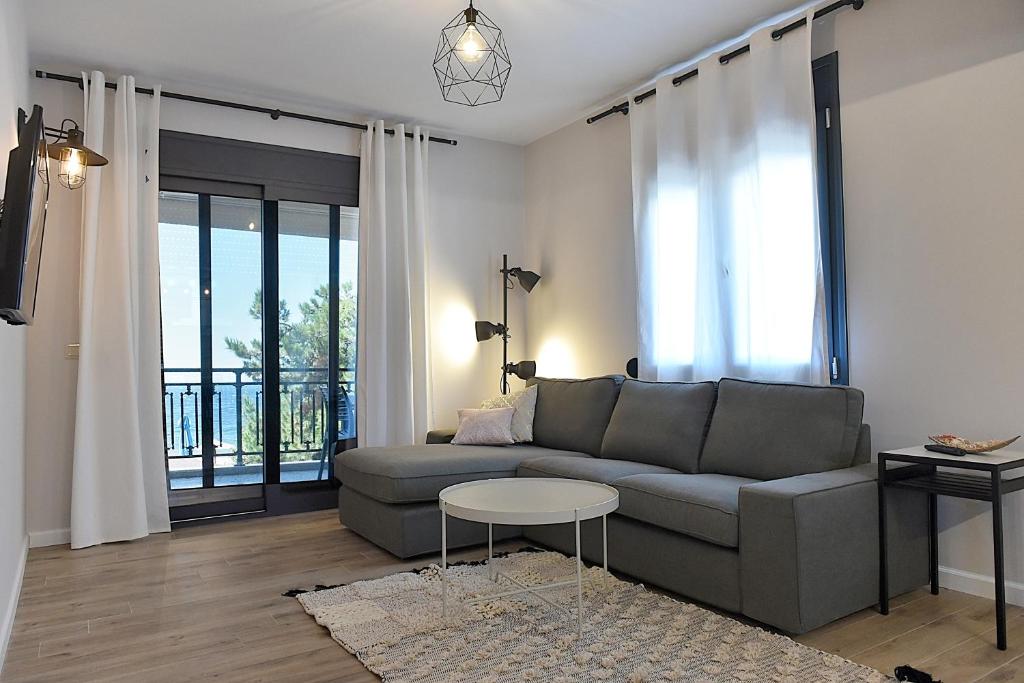 Posezení v ubytování Cos Seafront Apartments