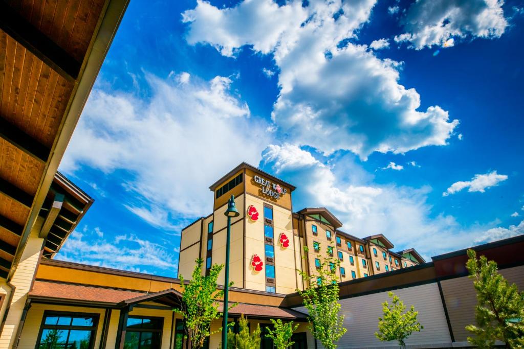a building with a clock on the side of it at Great Wolf Lodge Georgia in La Grange