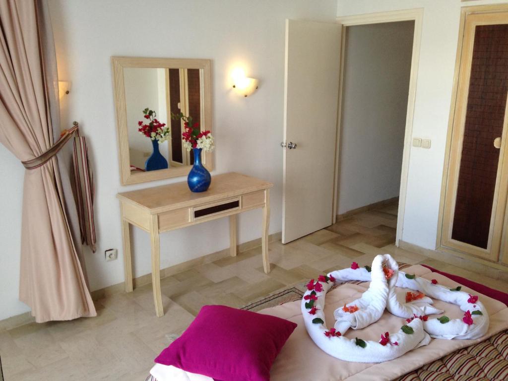 Postel nebo postele na pokoji v ubytování Appart Hotel Rodes