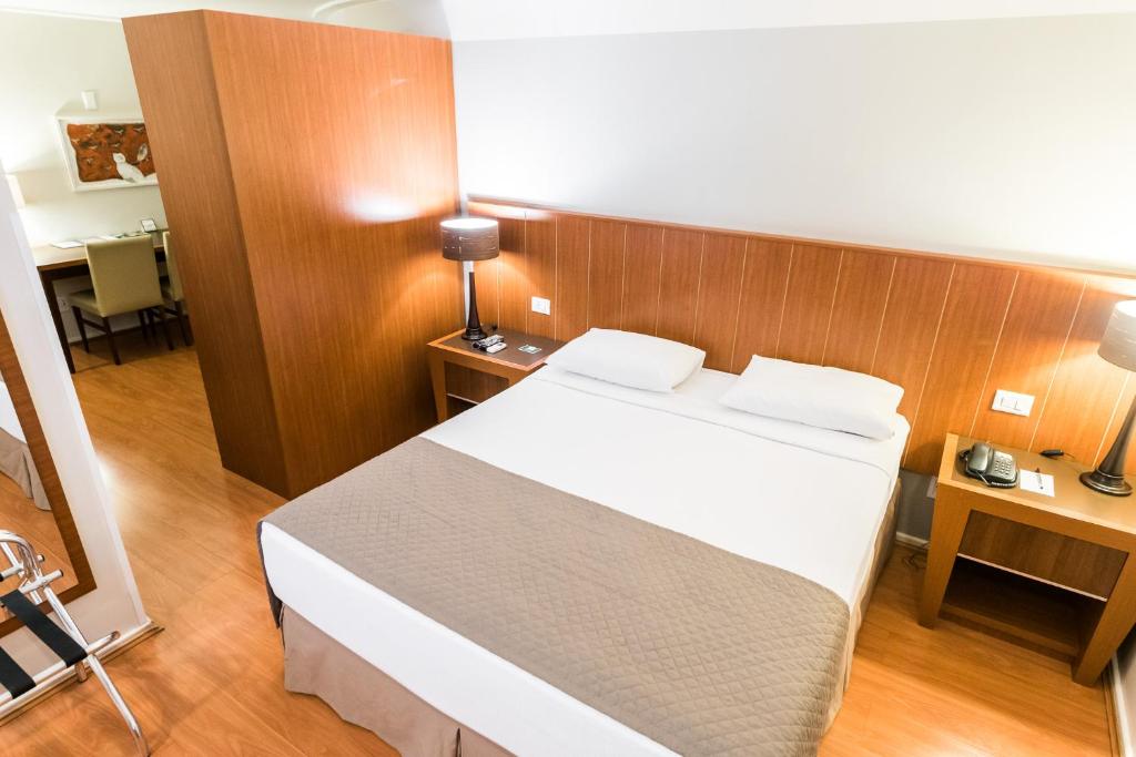Postel nebo postele na pokoji v ubytování Hotel Boulevard